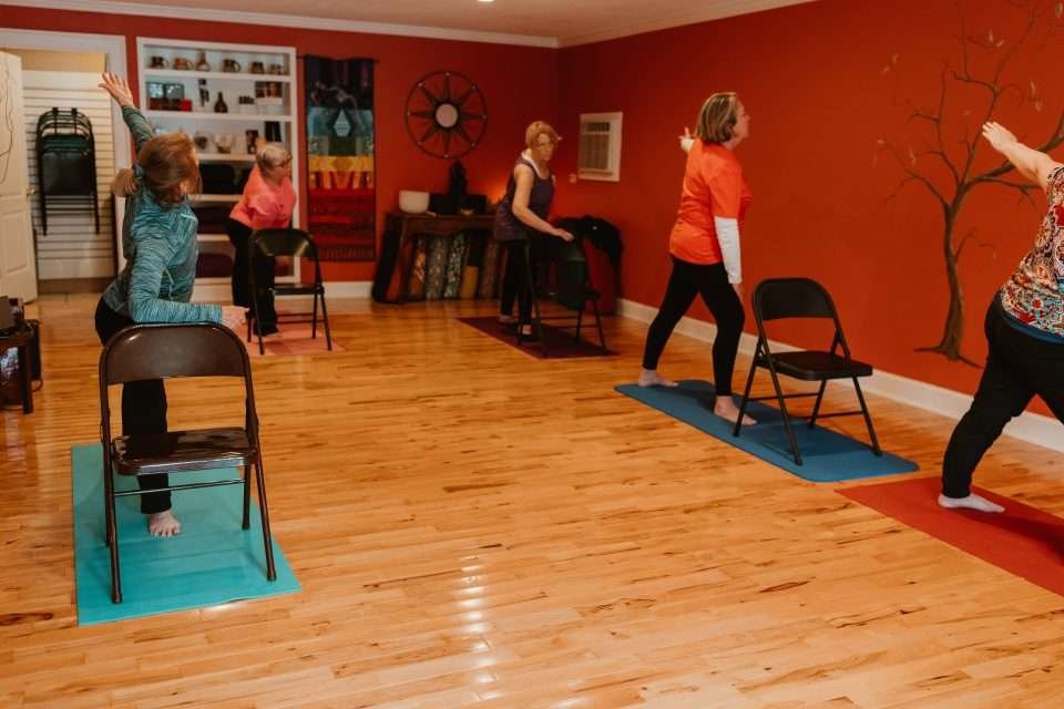 Bonnie’s class standing extended side angle with a chair for support