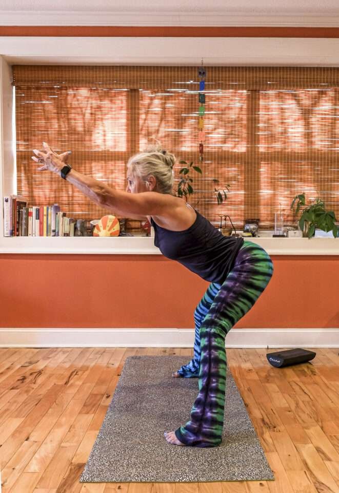 Sunrise Yoga Studio wide founder pose