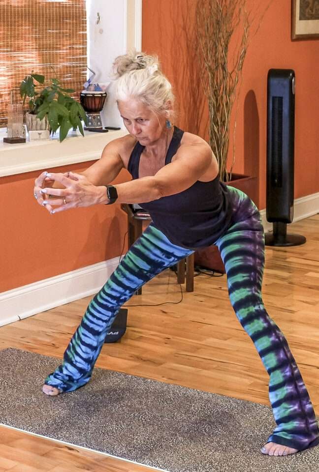 Sunrise Yoga Studio wide founder pose front